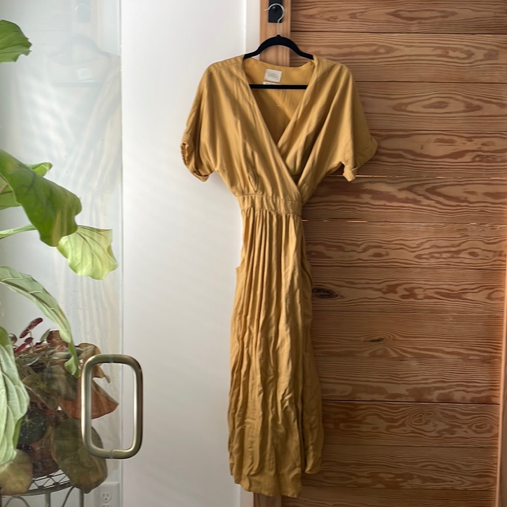 Beautiful mustard yellow Urban Outfitters wrap dress with pockets!